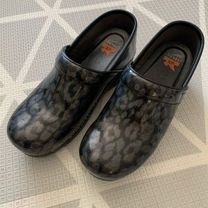 Women’s Dansko Black Leopard Clogs